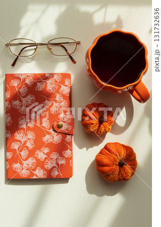 Autumn Flat Lay with Coffee Mug, Pumpkins and Seasonal Decor Autumn Flat Lay with Coffee Mug, Pumpkins and Seasonal Decor 131732636