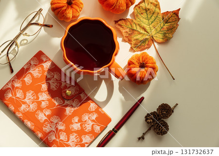 Autumn Flat Lay with Coffee Mug, Pumpkins and Seasonal Decor Autumn Flat Lay with Coffee Mug, Pumpkins and Seasonal Decor 131732637