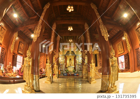 The statue of Phra Chao Pantan Buddha is enshrined in a teakwood chapel at Wat Den Sali Si Mueang Kaen temple or Wat Ban Den. Located at Chiang Mai Province in Thailand. The statue of Phra Chao Pantan Buddha is enshrined in a teakwood chapel at Wat Den Sali Si Mueang Kaen temple or Wat Ban Den. Located at Chiang Mai Province in Thailand. 131735395