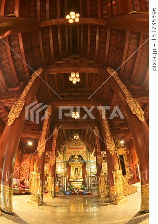 The statue of Phra Chao Pantan Buddha is enshrined in a teakwood chapel at Wat Den Sali Si Mueang Kaen temple or Wat Ban Den. Located at Chiang Mai Province in Thailand. The statue of Phra Chao Pantan Buddha is enshrined in a teakwood chapel at Wat Den Sali Si Mueang Kaen temple or Wat Ban Den. Located at Chiang Mai Province in Thailand. 131735396