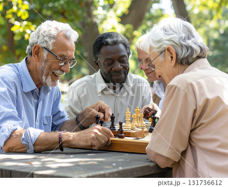 AI generated image of diverse seniors playing chess in a park with an AI-powered coach on a tablet. Natural light, joyful atmosphere, and social connection among friends. AI generated image of diverse seniors playing chess in a park with an AI-powered coach on a tablet. Natural light, joyful atmosphere, and social connection among friends. 131736612