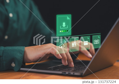 Person typing on laptop with icons of file download, cloud upload, folders and documents. Concept of cloud storage, data transfer, digital file management, online storage and information technology. 131737224