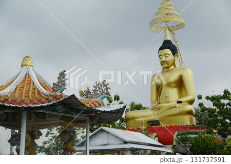 The world's largest outdoor Luang Pho Sothon statue is enshrined at Wat Nong Yai.The lap width is 10 meters and the height is 14 meters. It is located behind the chapel. The world's largest outdoor Luang Pho Sothon statue is enshrined at Wat Nong Yai.The lap width is 10 meters and the height is 14 meters. It is located behind the chapel. 131737591