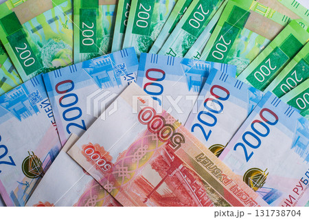 russian banknotes various denominations spread out on flat surface with vibrant colors. closeup. 131738704
