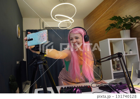 Beautiful young singer and musician broadcast from her home studio Beautiful young singer and musician broadcast from her home studio 131740128