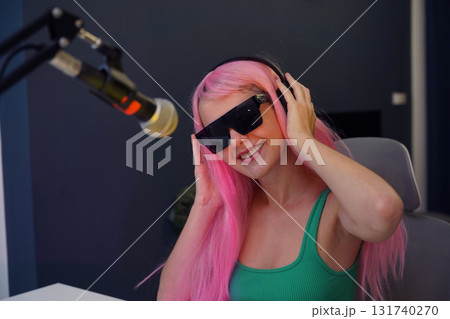 Beautiful young singer and musician broadcast from her home studio Beautiful young singer and musician broadcast from her home studio 131740270
