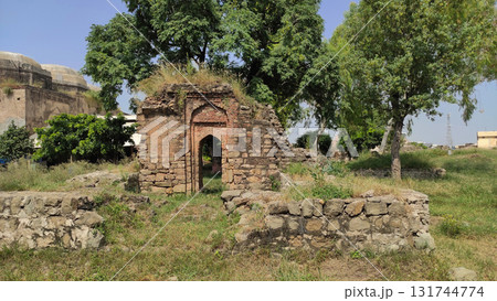 Damaged mausoleum wall inside Rawat Fort Rawalpindi Pakistan showing historic Mughal architecture and cultural heritage Damaged mausoleum wall inside Rawat Fort Rawalpindi Pakistan showing historic Mughal architecture and cultural heritage 131744774