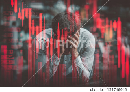 Stressed businessman with falling stock market graph overlay Stressed businessman with falling stock market graph overlay 131746946