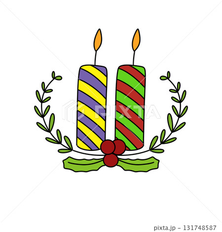 Two candles with green and red stripes on them are lit Two candles with green and red stripes on them are lit 131748587
