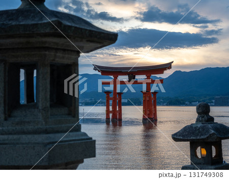Torii of Itsukushima Shrine at sunset on Miyajima island 131749308