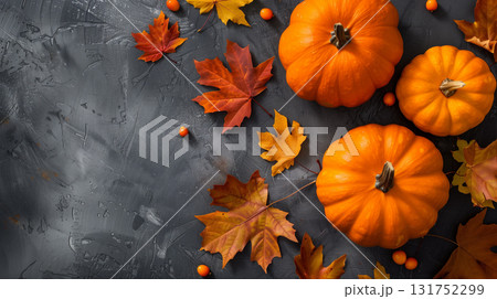 Happy Thanksgiving holiday background from autumn leaves, pumpkins and fall decorations on turquoise table. 131752299