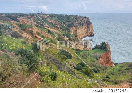 Rugged coastal landscape with cliffs and ocean in algarve, portugal 131752484