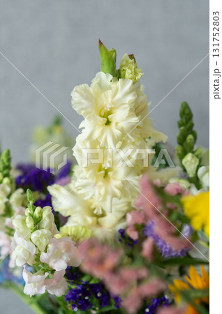 Vibrant floral arrangement with white and purple gladiolus. Teacher's Day in Uzbekistan 131752803