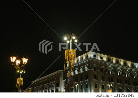 Illuminated street lamps and building at night Illuminated street lamps and building at night 131752849