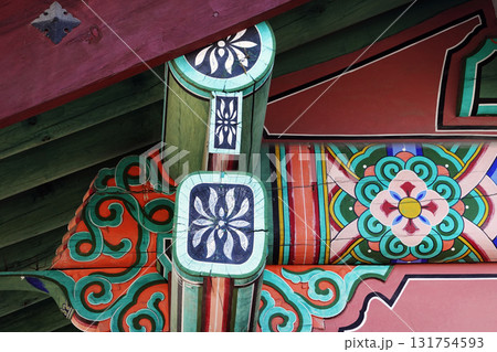 Traditional korean hanok dancheong wooden beam detail with colorful patterns Traditional korean hanok dancheong wooden beam detail with colorful patterns 131754593