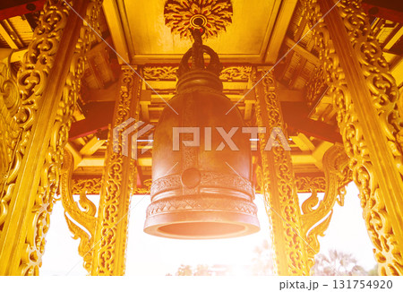 Symbols of Buddhism. Bells. South-Eastern Asia. Details of buddhist temple 131754920