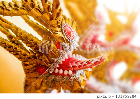 Symbols of Buddhism. South-Eastern Asia. Details of buddhist temple in Thailand. 131755284