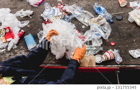 At modern recycling plant. Separate garbage collection. At modern recycling plant. Separate garbage collection. 131755345