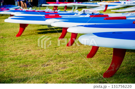 A lot of surfboards on the beach. Summer background A lot of surfboards on the beach. Summer background 131756220