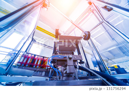 Automatic labeling machine during operation. Factory for the production  131756294