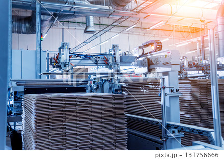 Production line of the wooden floor factory. CNC automatic woodworking machine. 131756666