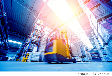 Forklift loader in storage warehouse ship yard. Distribution products.  131756696