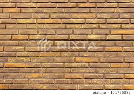 Close up of decorative fence wall with warm golden highlights. Pattern features evenly aligned horizontal bricks with textured surface. Ideal for use as seamless texture, backdrop, material reference 131756855