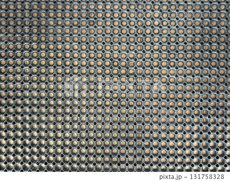 The background is a textured rubber mat with geometric shapes in black The background is a textured rubber mat with geometric shapes in black 131758328