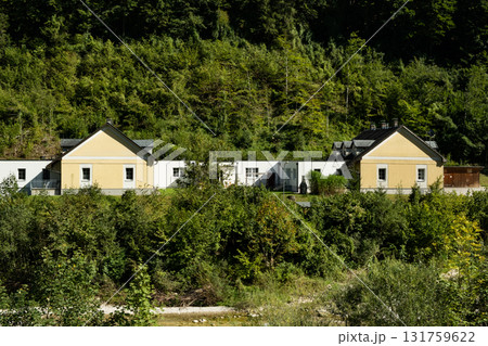 Traditional European Village with Charming Houses in Mountain Nature 131759622