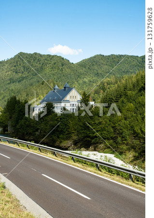 A perfect picture of the world, a house in the mountains in the middle of nature and silence. 131759628