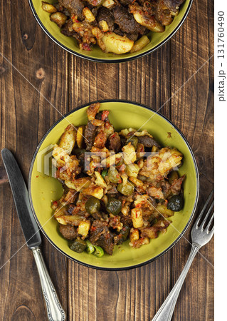 Meat stew made from beef with potatoes and pickles. Meat stew made from beef with potatoes and pickles. 131760490