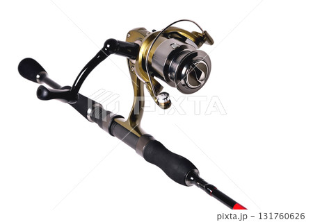 fishing reel on a fishing rod, white background close-up, copy space 131760626