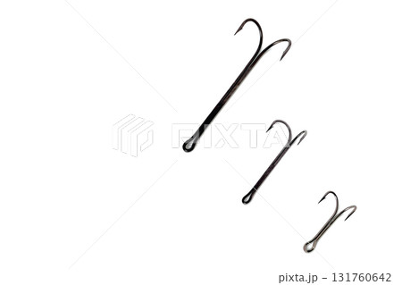 Three, double hooks of different sizes white background close-up Three, double hooks of different sizes white background close-up 131760642