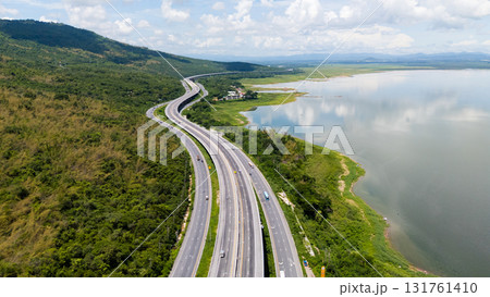Drone shot The M6 motorway Nakhon Ratchasima Province - Bang Pa-in Lam Ta Khong River and Mountain. Motorway Korat Thailand 131761410