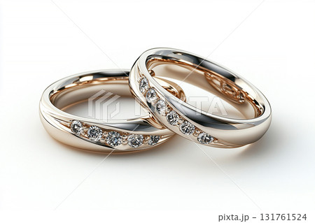 Pair of white gold wedding rings on a white background. Pair of white gold wedding rings on a white background. 131761524