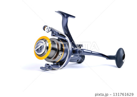 Coil for fishing inertial blue color on white background close-up isolate 131761629