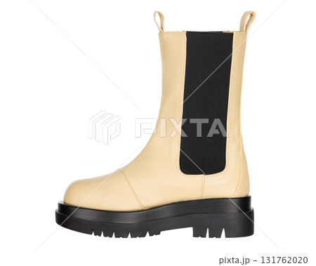 Beige chelsea boot with thick black sole and elastic side panel 131762020