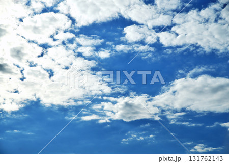 Clouds on the background of bright blue sky, summer day close-up 131762143