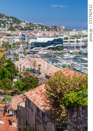 Cannes, France. Vertical aerial photo featuring coastal scene with a busy marina 131762412