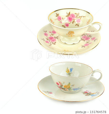 Pair of Antique Porcelain Teacups and Saucers with Floral Design 131764578