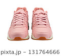 Pair of woman's sneakers isolated from background. Pink color. 131764666