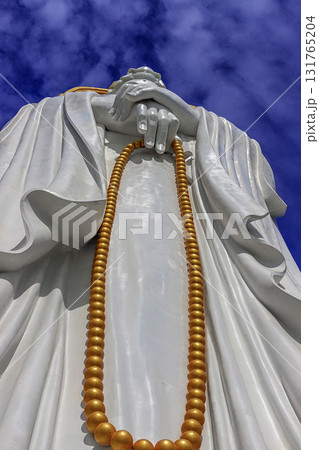 The Guanyin statue on Hainan Island, China. A majestic Buddhist monument by the sea The Guanyin statue on Hainan Island, China. A majestic Buddhist monument by the sea 131765204