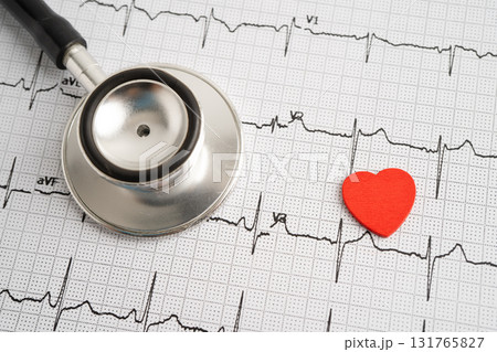 Stethoscope on electrocardiogram ECG, heart wave, heart attack, cardiogram report. Stethoscope on electrocardiogram ECG, heart wave, heart attack, cardiogram report. 131765827