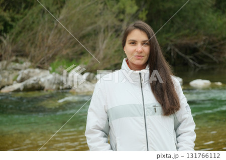 Natural Portrait of 30-Year-Old Brunette Woman Outdoors Without Makeup Natural Portrait of 30-Year-Old Brunette Woman Outdoors Without Makeup 131766112