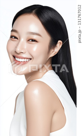 Bright smile and glowing skin of a Korean woman in a studio setting, showcasing natural beauty and confidence Bright smile and glowing skin of a Korean woman in a studio setting, showcasing natural beauty and confidence 131767012