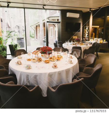 A sophisticated venue prepared for a corporate event, business conference, or formal gala. 131767033