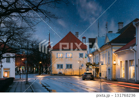 Kuressaare, Estonia. Building Of Noble Assembly And Kuressaare Town Hall At Lossi Street In Evening Or Night Illuminations 131768236