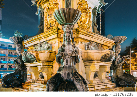 Batumi, Adjara, Georgia. Decorative Details Of Neptune Fountain In Park On Rustaveli Ave. Famous Landmark In Night Illumination 131768239