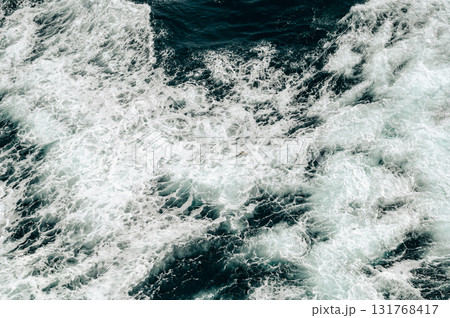 Abstract blue sea water with white wave for background. High quality photo 131768417