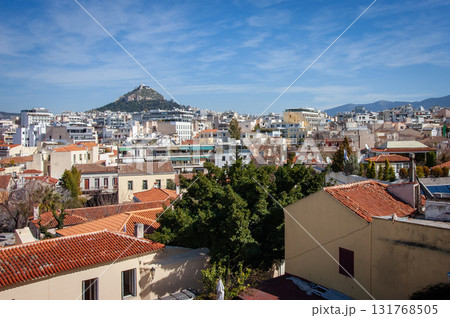 Panorama of Athens with rooftops and Acropolis hill in the background, Athens, Greece, Europe. Panorama of Athens with rooftops and Acropolis hill in the background, Athens, Greece, Europe. 131768505